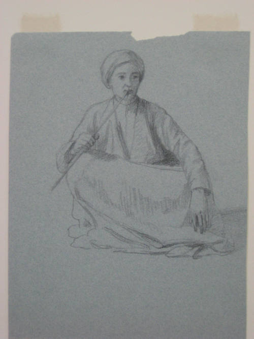 Untitled - Arab seated cross-legged holding a pipe to his mouth