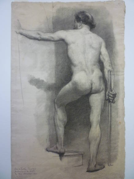 Rear-view of standing male nude with staff in right hand