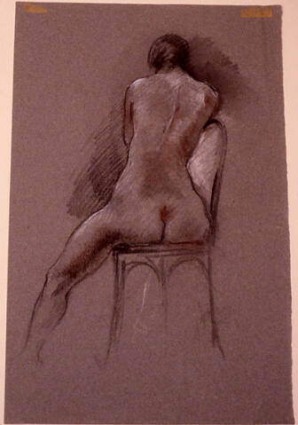 Back of seated female nude